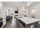 Spacious kitchen with modern appliances, stone countertops, and an open layout into the living space at 2978 Edgemont Ln, Marietta, GA 30008