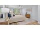 Bright bedroom with wood floors, neutral paint, ceiling fan, and a decorative rug in a neutral palette at 5273 Glenridge Dr # 5273, Sandy Springs, GA 30342