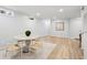 An elegant dining room with modern wood floors and lots of natural light at 5273 Glenridge Dr # 5273, Sandy Springs, GA 30342