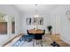 Bright dining room with modern decor and access to patio at 5273 Glenridge Dr # 5273, Sandy Springs, GA 30342