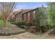 Townhouse nestled on a gently sloping hill with lush landscaping at 5273 Glenridge Dr # 5273, Sandy Springs, GA 30342