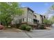 Charming townhome featuring a brick base, attached garage, and well-maintained landscaping at 5273 Glenridge Dr # 5273, Sandy Springs, GA 30342
