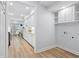 Galley kitchen with new appliances and an adjacent laundry nook at 5273 Glenridge Dr # 5273, Sandy Springs, GA 30342