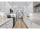 Bright kitchen with white subway tile backsplash and modern stainless steel appliances at 5273 Glenridge Dr # 5273, Sandy Springs, GA 30342