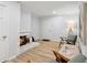 Inviting living room with wood floors, fireplace, and ample natural light at 5273 Glenridge Dr # 5273, Sandy Springs, GA 30342