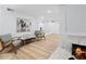 Comfortable living room featuring modern decor, a fireplace, and wood floors at 5273 Glenridge Dr # 5273, Sandy Springs, GA 30342