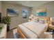 Comfortable, virtually staged bedroom featuring a cozy bed, decor, and natural light streaming through the window at 8120 Berrywood Ct, Covington, GA 30014