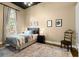 Cozy bedroom with a large window, hardwood floors, a comfortable bed, and neutral decor at 1459 Village Park Ct, Atlanta, GA 30319