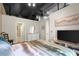 Comfortable bedroom featuring wood floors, TV, and ensuite bath for convenience at 1459 Village Park Ct, Atlanta, GA 30319