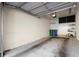 Interior of an empty two car garage with white walls at 1459 Village Park Ct, Atlanta, GA 30319