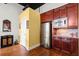 Kitchen area featuring wood cabinets and stainless steel appliances at 1459 Village Park Ct, Atlanta, GA 30319