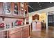 Kitchenette area with granite countertops and display cabinets at 1459 Village Park Ct, Atlanta, GA 30319