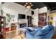 Living room featuring a fireplace, hardwood floors, and modern decor at 1459 Village Park Ct, Atlanta, GA 30319