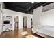 Spacious main bedroom featuring hardwood floors, a ceiling fan and ample natural light at 1459 Village Park Ct, Atlanta, GA 30319