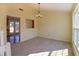 Bright dining room featuring new carpet and access to the kitchen at 1614 Carrie Farm Ct, Kennesaw, GA 30144