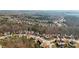 Aerial view of a residential neighborhood, emphasizing the community's design at 3308 Hunting Creek Pass, Douglasville, GA 30135