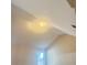 Well-lit attic space with a vaulted ceiling and modern lighting at 3308 Hunting Creek Pass, Douglasville, GA 30135