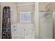 Modern bathroom features a bathtub and sliding glass door shower at 3308 Hunting Creek Pass, Douglasville, GA 30135