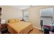Bedroom features neutral decor, laminate flooring, and a dresser with decorative brass pulls at 3308 Hunting Creek Pass, Douglasville, GA 30135