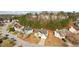 Two-story home with a well-manicured front lawn and a two-car garage, in a neighborhood with mature trees at 3308 Hunting Creek Pass, Douglasville, GA 30135