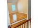 Bright living room featuring hardwood floors and natural light from large window at 3308 Hunting Creek Pass, Douglasville, GA 30135