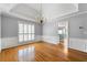 Bright dining room features hardwood floors and large windows at 5445 Mountain Trl, Douglasville, GA 30135