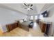 Spacious main bedroom showcasing a ceiling fan, seating, and two dressers at 1317 Bustling Sw Ln, Marietta, GA 30064