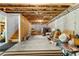 Unfinished basement with exposed ceiling, concrete floor, and wooden support beams, ready for customization at 140 Discovery Lake Dr, Fayetteville, GA 30215