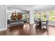 Open dining area with hardwood floors and chandelier at 140 Discovery Lake Dr, Fayetteville, GA 30215
