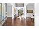 Elegant foyer with hardwood floors, a staircase, and views into the adjacent dining room at 140 Discovery Lake Dr, Fayetteville, GA 30215