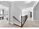Hallway with carpet flooring and the entrance to the main bedroom with detailed trim work around the door at 140 Discovery Lake Dr, Fayetteville, GA 30215