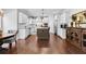 Open kitchen with white cabinets and island at 140 Discovery Lake Dr, Fayetteville, GA 30215