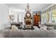 Spacious living room with stone fireplace and refined decor at 140 Discovery Lake Dr, Fayetteville, GA 30215