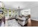Bright living room with large windows and comfortable seating at 140 Discovery Lake Dr, Fayetteville, GA 30215