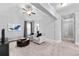 Comfortable sitting room featuring neutral paint, vaulted ceilings, and a cozy seating area at 140 Discovery Lake Dr, Fayetteville, GA 30215