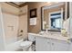 Updated bathroom with granite countertops, a tub, and designer tile work at 2805 Cambria Ct, Cumming, GA 30041