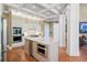 Gourmet kitchen with a large island, stainless steel appliances, granite countertops, and coffered ceilings at 2805 Cambria Ct, Cumming, GA 30041