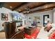 Stunning living room with views, wood ceilings and comfortable seating at 2805 Cambria Ct, Cumming, GA 30041