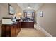 Office space featuring a large desk, ample storage, and natural light at 2805 Cambria Ct, Cumming, GA 30041