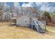 A beautiful house featuring a spacious yard and a deck, perfect for outdoor entertaining at 4251 Klondike Rd, Lithonia, GA 30038