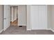 Bedroom with closet and neutral walls at 4251 Klondike Rd, Lithonia, GA 30038