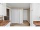 Kitchen view with white cabinets and pantry at 4251 Klondike Rd, Lithonia, GA 30038