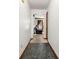 Entryway with tile flooring leading to the living area at 7281 Fernwood Dr, Riverdale, GA 30296
