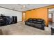 Spacious living room with entertainment center and comfortable seating at 7281 Fernwood Dr, Riverdale, GA 30296