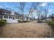 Large backyard with manicured landscaping and ample space for recreation and entertaining at H-5422 Hill Sw Rd, Powder Springs, GA 30127