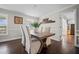 Dining area with natural light and hardwood floors, perfect for entertaining at H-5422 Hill Sw Rd, Powder Springs, GA 30127
