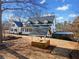 A backyard gazebo adds charm to the landscape of this home at H-5422 Hill Sw Rd, Powder Springs, GA 30127