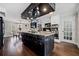 Open kitchen layout with modern appliances, center island, and adjacent dining area at H-5422 Hill Sw Rd, Powder Springs, GA 30127