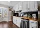 Well-lit kitchen with stainless steel appliances and butcher block countertops at H-5422 Hill Sw Rd, Powder Springs, GA 30127