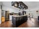 Expansive kitchen featuring a large island, modern appliances, and stylish decor at H-5422 Hill Sw Rd, Powder Springs, GA 30127